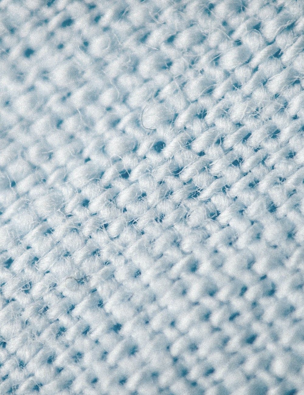 Fanaar piqué fabric showing its honeycomb texture